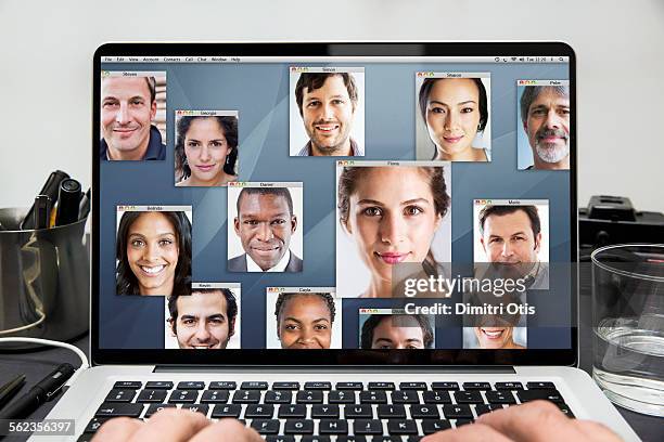 many portraits on laptop computer screen - dating stockfoto's en -beelden