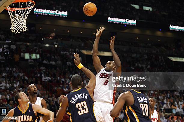 Antoine Walker of the Miami Heat shoots over Danny Granger of the Indiana Pacers during a game at American Airlines Arena November 3, 2005 in Miami,...