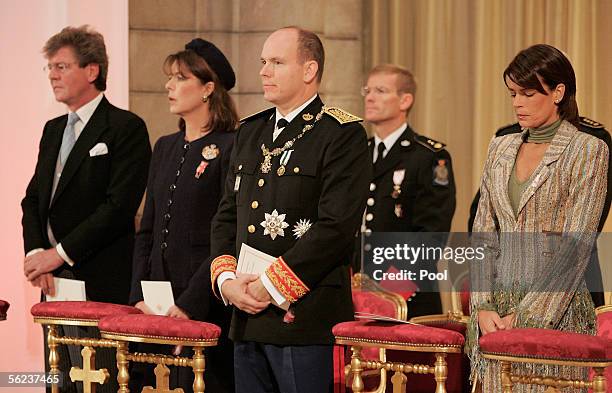 Prince Ernst August of Hanover, Princess Caroline of Hanover, Prince Albert II of Monaco and Princess Stephanie of Monoco listen to Mass in the...