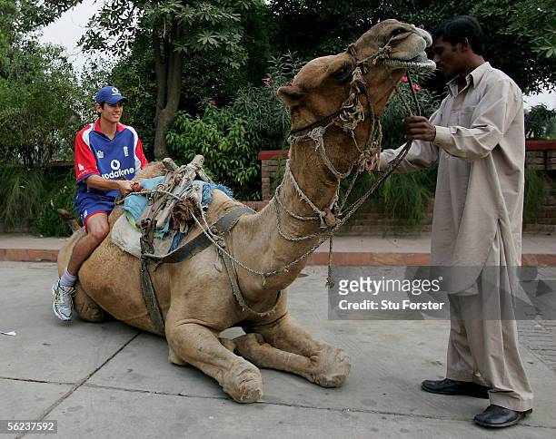 Recent addition to the touring party, England batsman Alastair Cook on board a local camel at The Serena Hotel on November 19, 2005 in Faisalabad,...