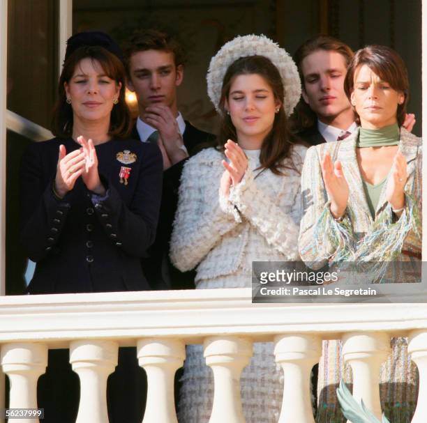 Princess Caroline of Hanover, Pierre Casiraghi, Charlotte Casiraghi, Andrea Casiraghi and Princess Stephanie of Monaco applaud the Military Parade as...