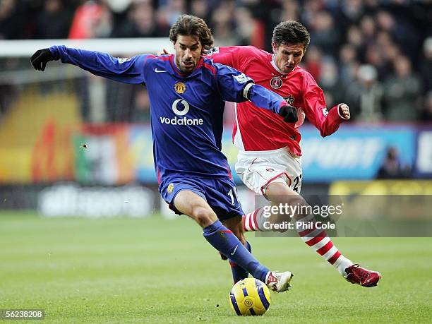 Ruud Van Nistelrooy of Manchester United holds off Alexei Smertin of Charlton Athletic during the Barclays Premiership match between Charlton...