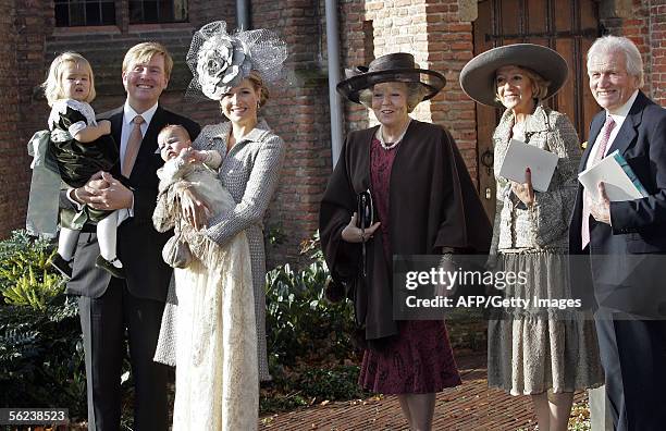 Wassenaar, NETHERLANDS: Dutch crown prince Willem-Alexander and Princess Maxima carry their daughter Alexia into the Village Church for her...