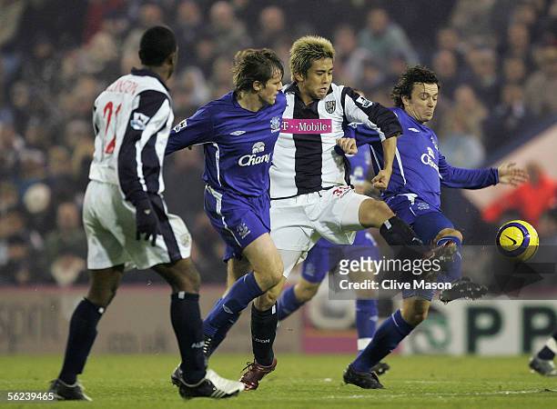 Junichi Inamoto of West Bromwich Albion is crowded out during the Barclays Premiership match between West Bromwich Albion and Everton at The...