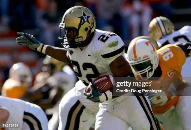 Cassen Jackson-Garrison of the Vanderbilt Commodores rushes for a first quarter touchdown against the Tennessee Volunteers as the Commodores defeated...