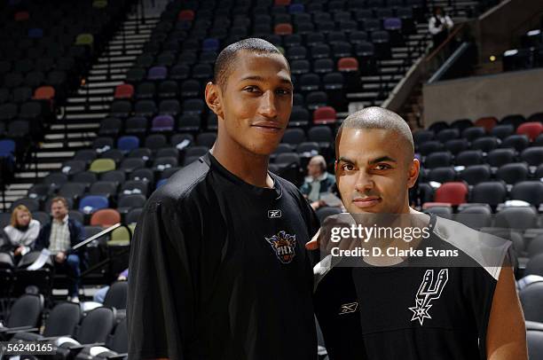 Boris Diaw of the Phoenix Suns and Tony Parker of the San Antonio Spurs, both French-born players, pose before their game at the SBC Center on...