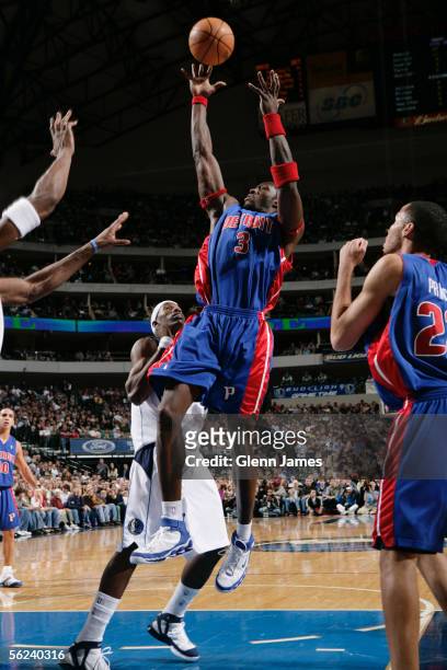Ben Wallace of the Detroit Pistons goes up for a rebound against the Dallas Mavericks at American Airlines Center November 19, 2005 in Dallas, Texas....