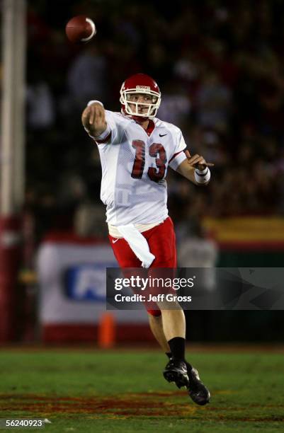 Paul Pinegar of the Fresno State Bulldogs throws a pass against the USC Trojans during the first quarter of the game at the Los Angeles Memorial...