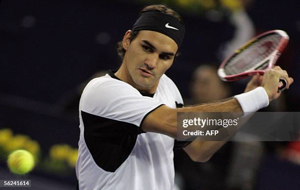 World number one Roger Federer of Switzerland, plays a shot during the finals match against David Nalbandian of Argentina at the 4.45 million USD...
