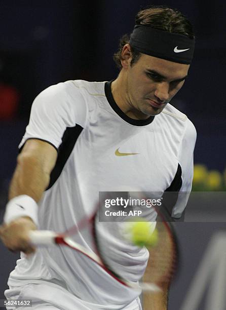 World number one Roger Federer of Switzerland, plays a shot during the finals match against David Nalbandian of Argentina at the 4.45 million USD...