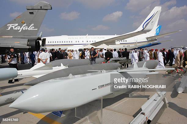 Emirati and foreign visitors pass behind the French made Storm Shadow/Scalp EG cruise missiles at the opening of the five-day Dubai Air Show in Dubai...