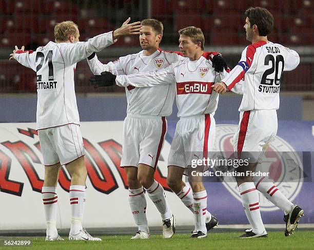 Ludovic Magnin, Thomas Hitzelsperger, John Dahl Tomasson and Zvonimir Soldo of Stuttgart celebrate after the first goal during the Bundesliga match...