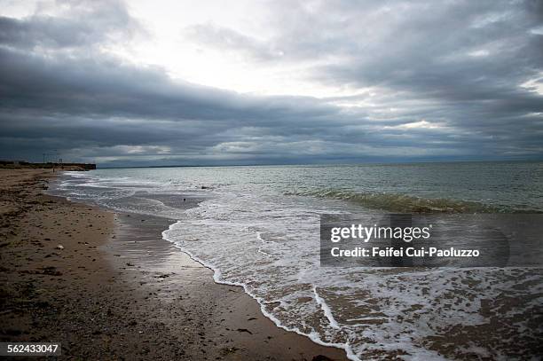 rosslare beach in a dramatic light county wexford - county wexford stock pictures, royalty-free photos & images