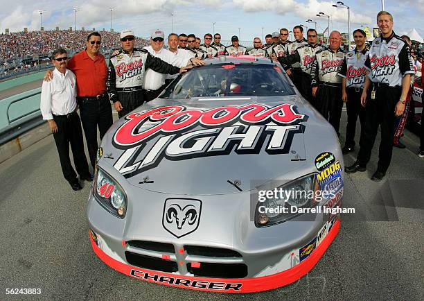 Sterling Marlin poses with team owners Chip Ganassi, Felix Sabates and the crew of the Ganassi Racing Coors Light Dodge prior to the start of the...