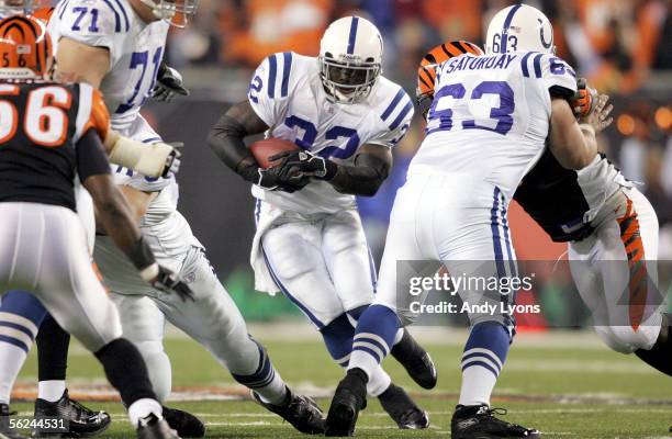 Edgerrin James of the Indianapolis Colts runs with the ball against the Cincinnati Bengals during the NFL game at Paul Brown Stadium on November 20,...