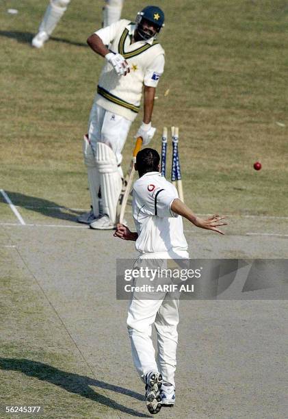 England cricketer Steve Harmison successfully hits the wicket to run out Pakistani cricket captain Inzamam-ul-Haq during the second day of the second...