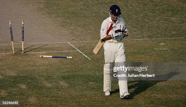 Michael Vaughan of England walks of after being bowled by Rana Naveed ul Hassan at The Iqbal Cricket Stadium on day two of the 2nd Test Match played...