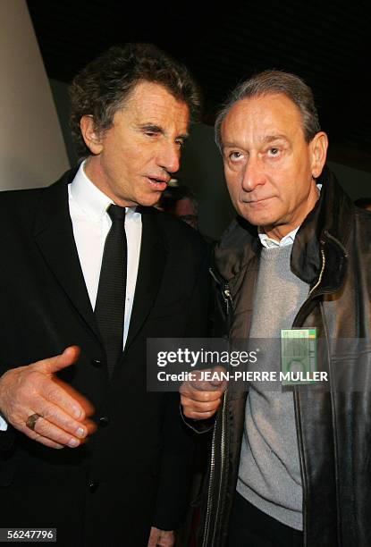 French socialist deputy Jack Lang speaks with Mayor of Paris Bertrand Delanoe during the Socialist Party Congress, 19 November in Le Mans. AFP PHOTO...
