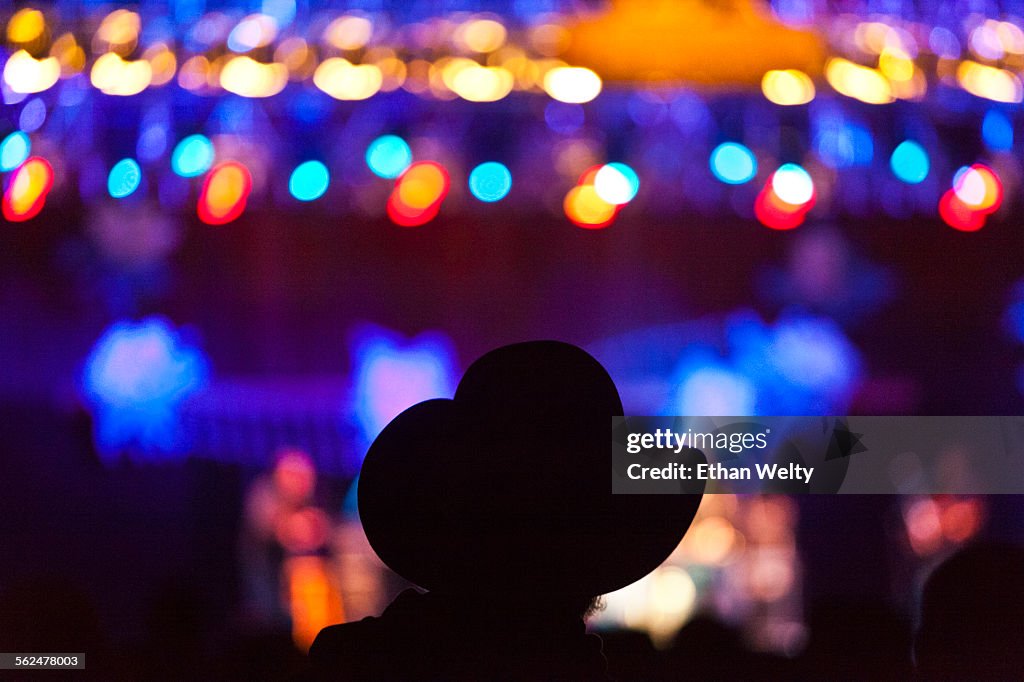 An audience member in a cowboy hat at the Telluride Bluegrass Festival in Telluride, Colorado.