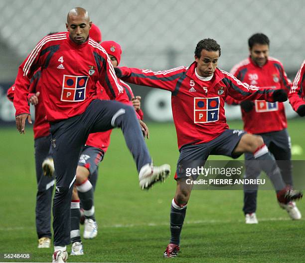 Benfica Lisbon's defenders Luisao and Leo warm up during a training session, 21 November 2005 at the Stade de France in Saint-Denis, north of Paris,...