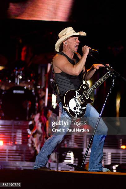 American country musician Kenny Chesney performs with his band onstage at Soldier Field, Chicago, Illinois, June 13, 2009.