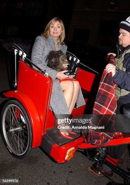 Kim Cattrall rides around Columbus Circle in a Pedi-cab carying an ape head after filming a segment for the Ellen DeGeneres Show on November 21, 2005...