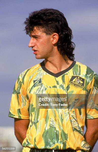 Peter Tsekinis of the Young Socceroos looks on during the singing of the National Anthem before the start of a soccer match between Australia and...