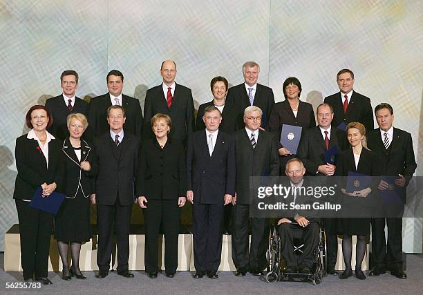 Newly elected German Chancellor Angela Merkel poses with her left-right coalition cabinet and German President Horst Koehler November 22, 2005 at...