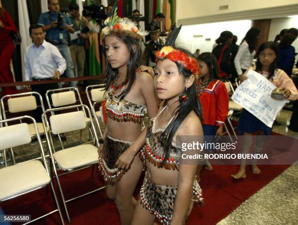 Children belonging to the Amazonian Huaorani ethnic group leave 22 November, 2005 the Congress building in Quito. Indigenous children from several...