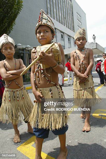 Children belonging to the Amazonian Huaorani ethnic group leave 22 November, 2005 the Congress building in Quito. Indigenous children from several...