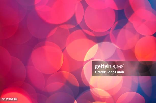 bokeh background - red and pink background stock pictures, royalty-free photos & images