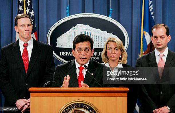 Attorney General Alberto Gonzales answers questions at the Justice Department with Deputy Director of the FBI, John Pistole , Assistant Attorney...