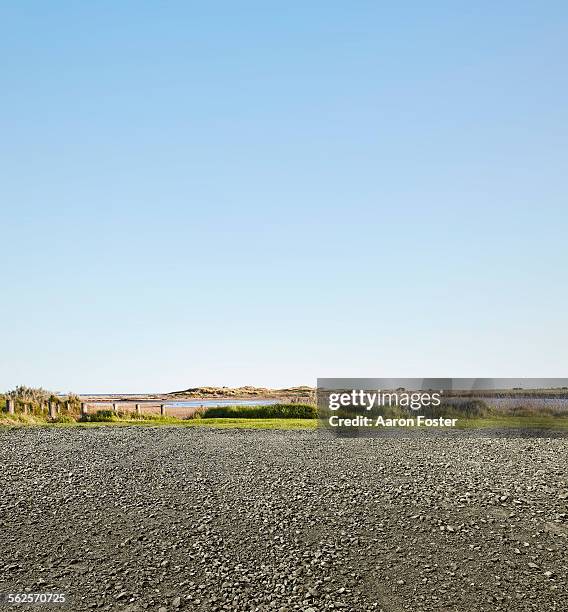 beach side parking - gravel stock pictures, royalty-free photos & images