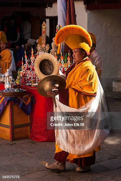 monk playing cymbals - mani rimdu festival stock pictures, royalty-free photos & images