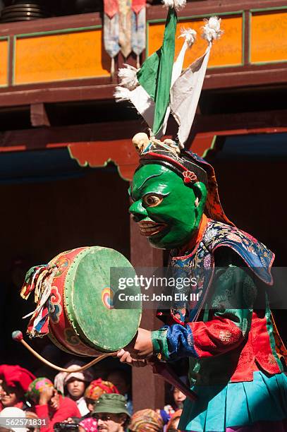 masked temple dancer playing drum - thyangboche monastery stock pictures, royalty-free photos & images