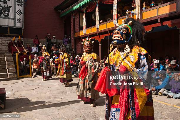 masked temple dancers - thyangboche monastery stock pictures, royalty-free photos & images