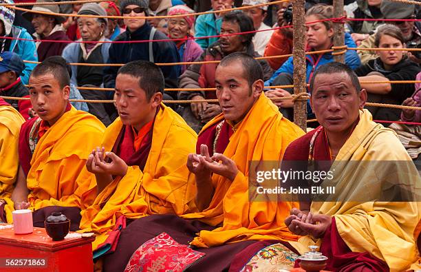 monks seated for mani rimdu celebration - thyangboche monastery stock pictures, royalty-free photos & images
