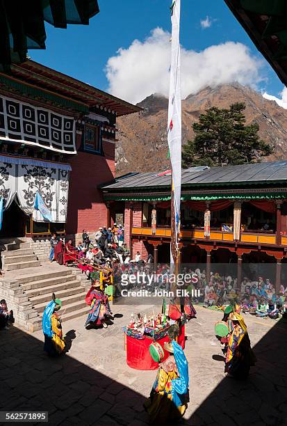 temple courtyard with monk dancers - thyangboche monastery stock pictures, royalty-free photos & images