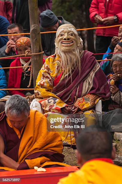 chaghan ebugen old white man masked figure - mani rimdu festival stock pictures, royalty-free photos & images