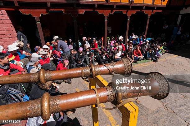 monks playing giant trumpets - mani rimdu festival stock pictures, royalty-free photos & images