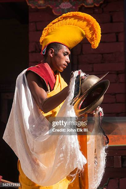 monk playing cymbals - thyangboche monastery stock pictures, royalty-free photos & images