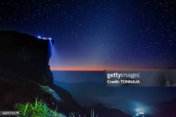 phu chi fa and zodiacal light - zodiacal light stock pictures, royalty-free photos & images