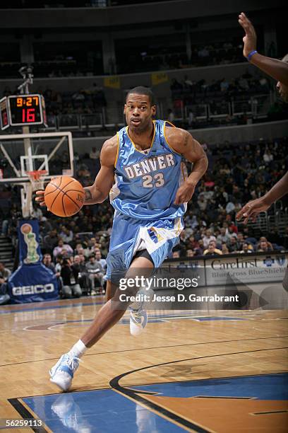 Marcus Camby of the Denver Nuggets drives against the Washington Wizards on November 22, 2005 at the MCI Center in Washington, DC. NOTE TO USER: User...