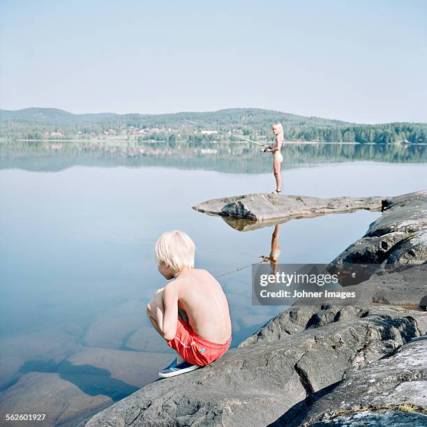 children at water - dalarna stock pictures, royalty-free photos & images