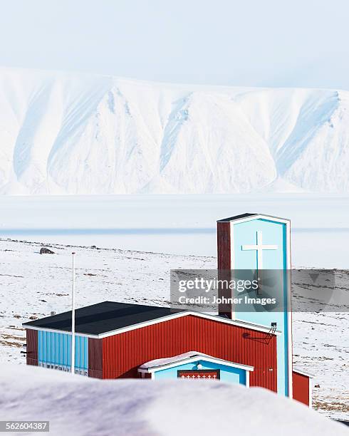 wooden church in snowy landscape - qaanaaq stock pictures, royalty-free photos & images