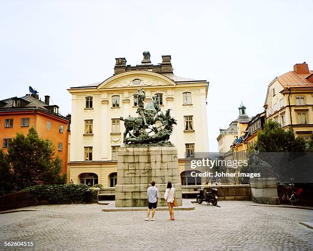 tourists in the old town, stockholm. - gamla stan stockholm stock pictures, royalty-free photos & images