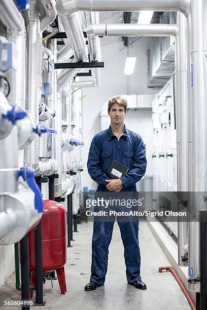 worker in industrial plant, portrait - coveralls ストックフォトと画像