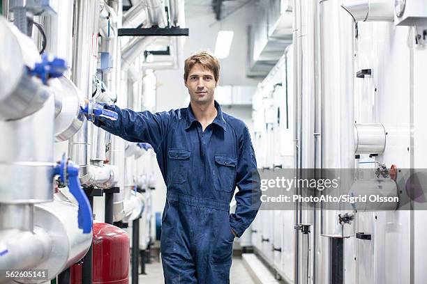 skilled worker in industrial plant, portrait - overall stock pictures, royalty-free photos & images