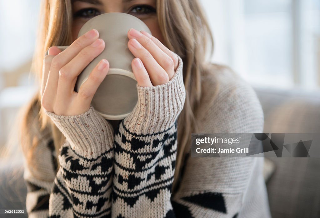 Young woman with mug