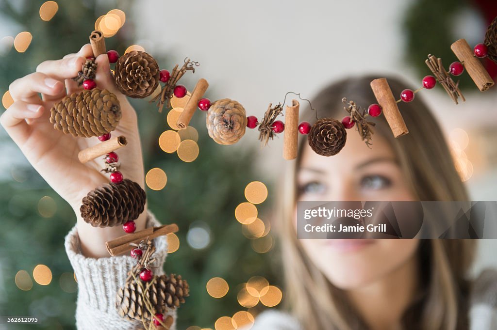 Woman preparing christmas decoration